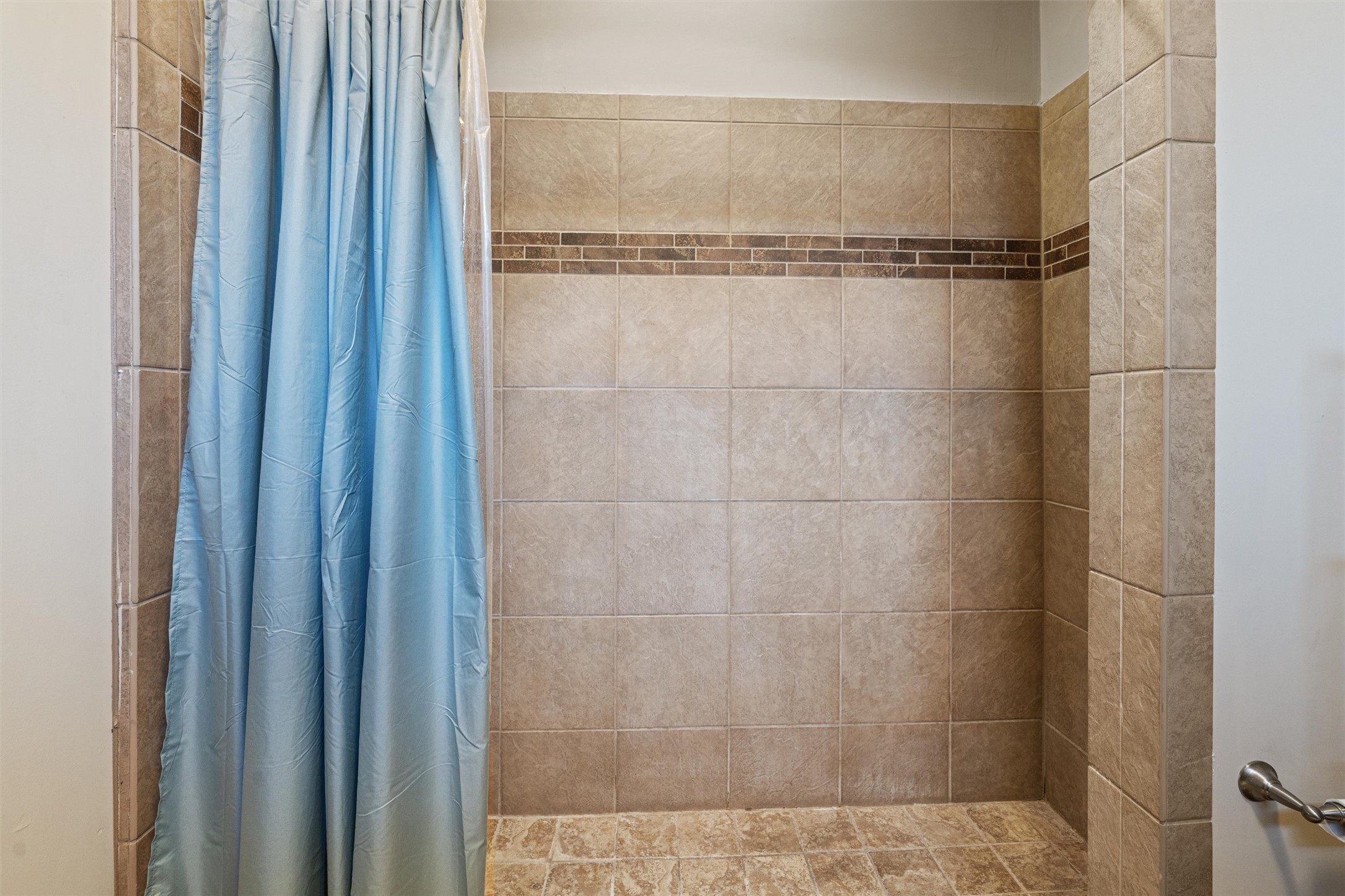209 Harris Street Elgin, TX 78621 - Photo 15 of 40 Bathroom featuring a shower stall