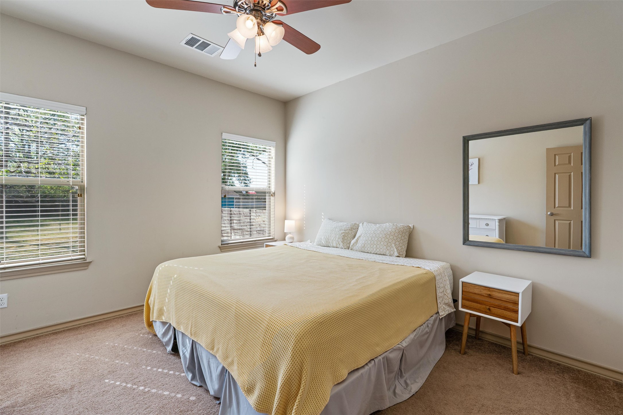 209 Harris Street Elgin, TX 78621 - Photo 16 of 40 Carpeted bedroom with baseboards and ceiling fan