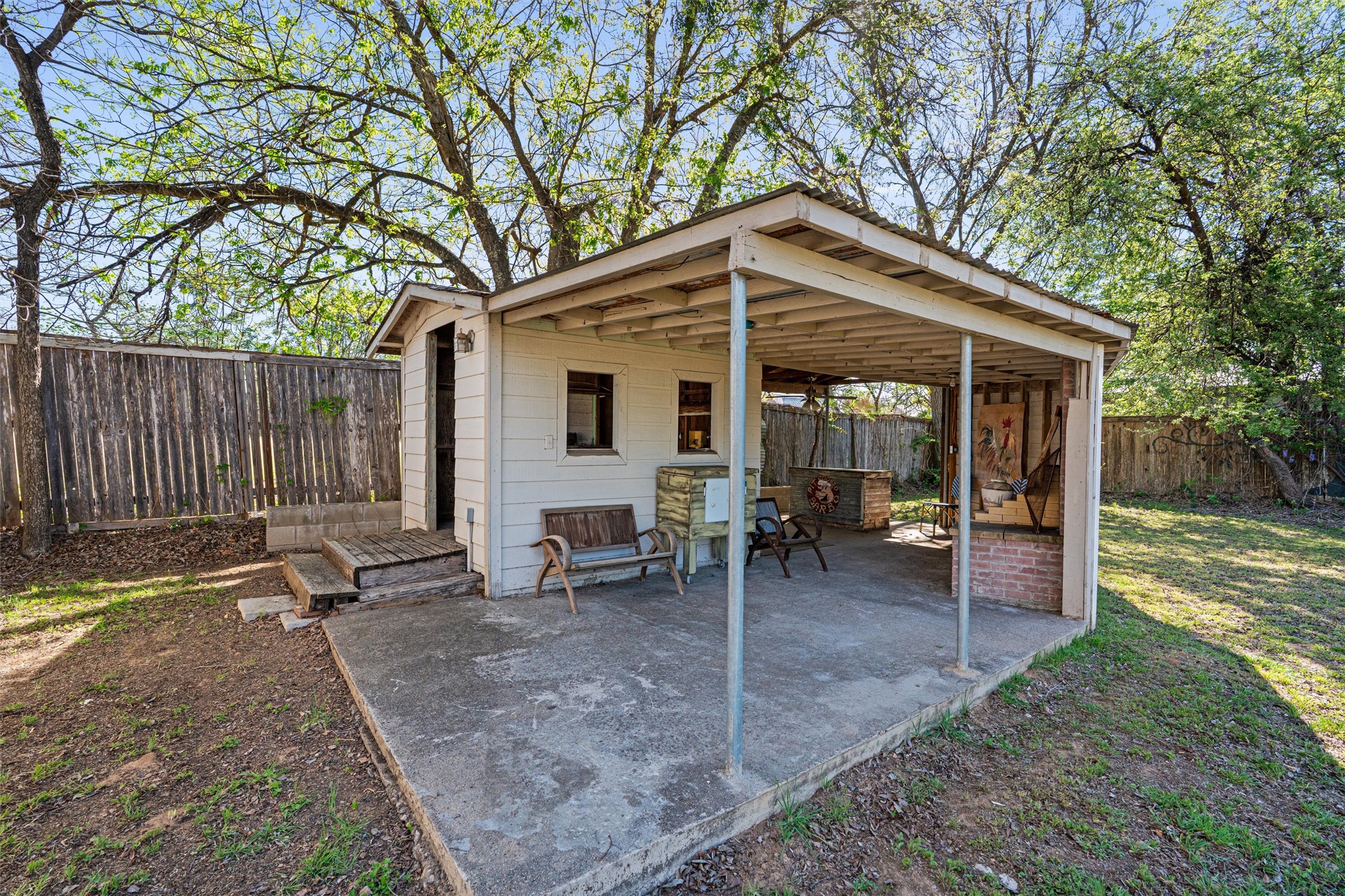 209 Harris Street Elgin, TX 78621 - Photo 31 of 40 Fenced backyard with a patio