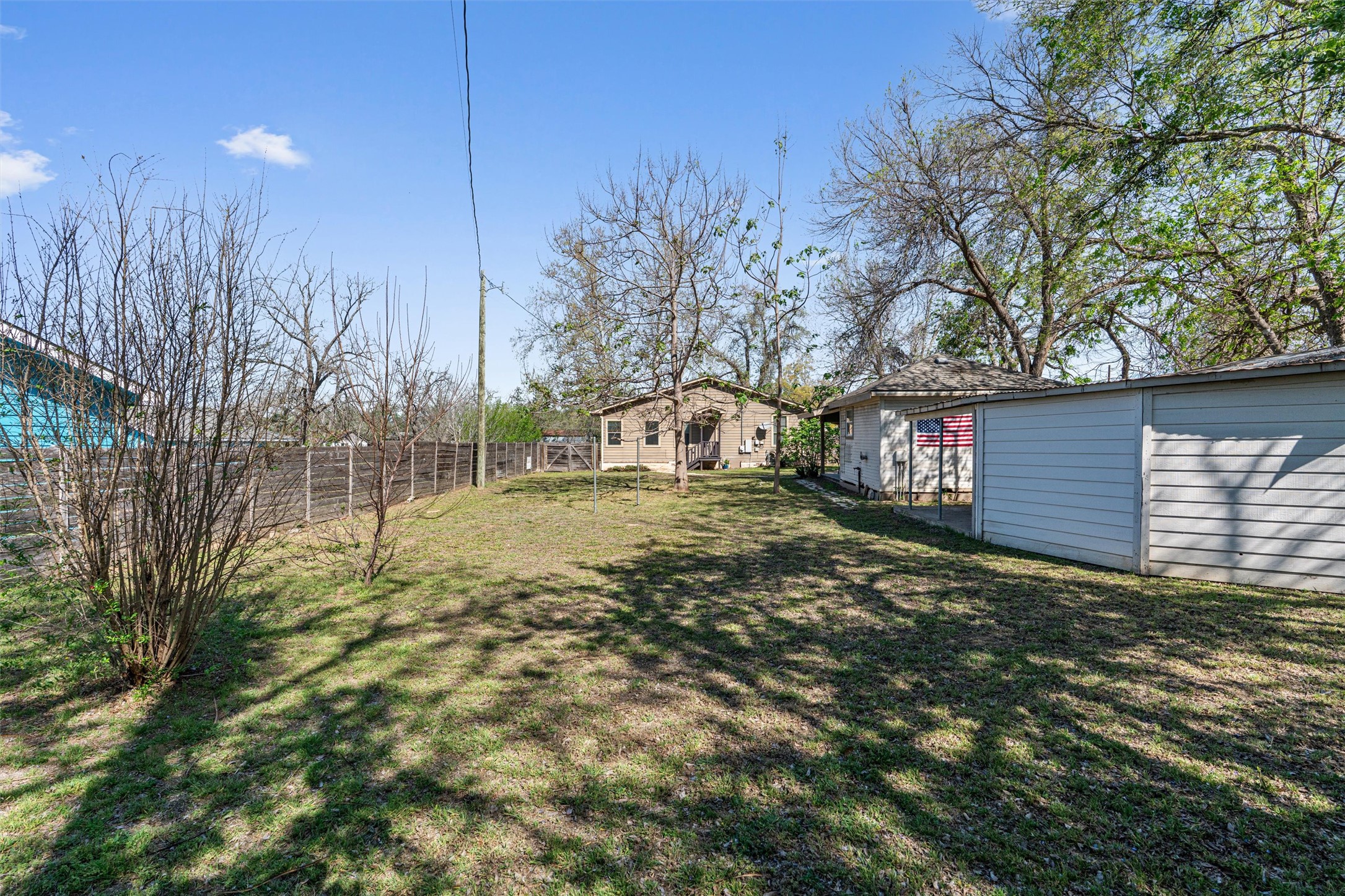 209 Harris Street Elgin, TX 78621 - Photo 36 of 40 View of fenced backyard