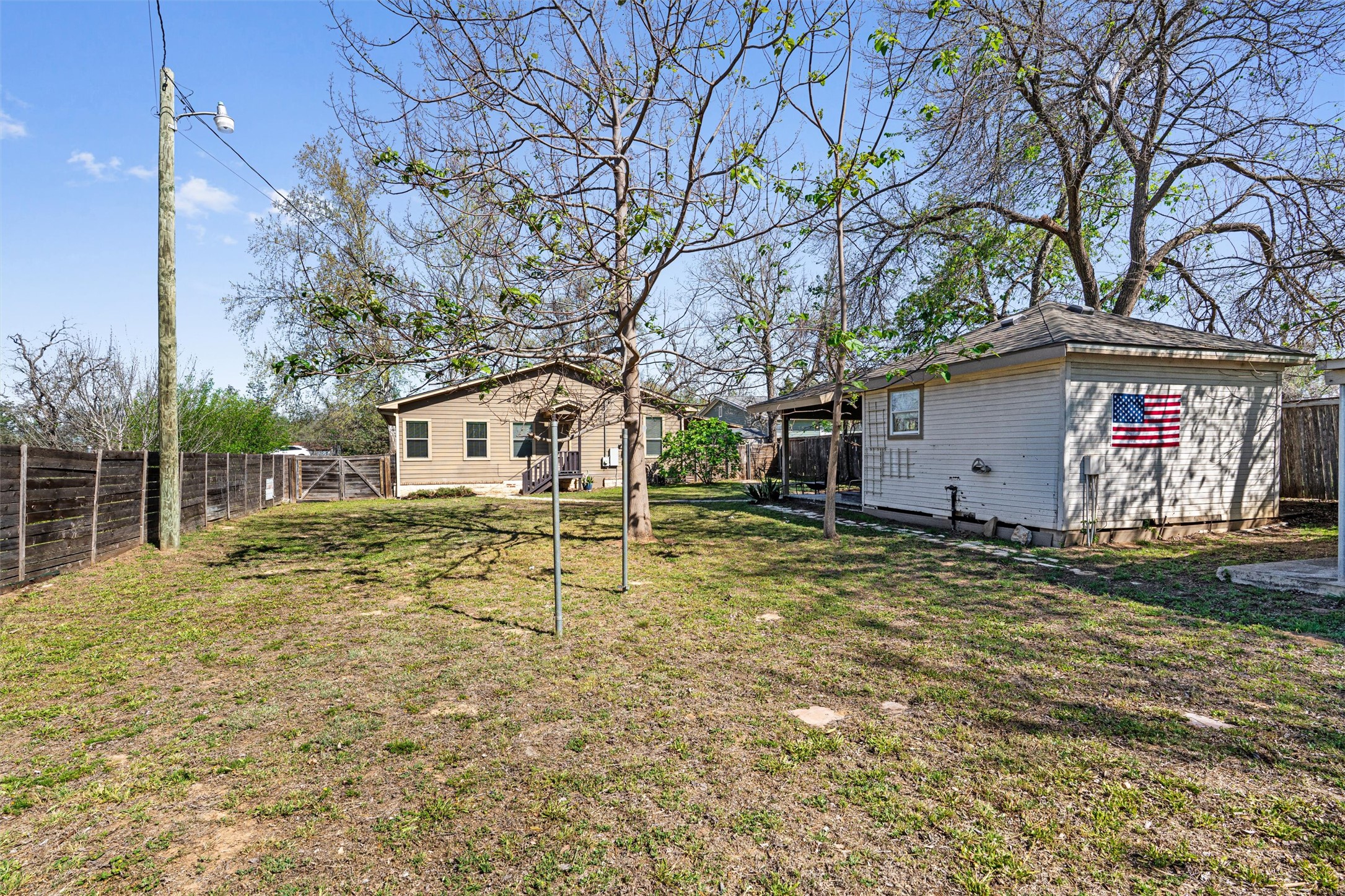 209 Harris Street Elgin, TX 78621 - Photo 37 of 40 Fenced backyard featuring a gate