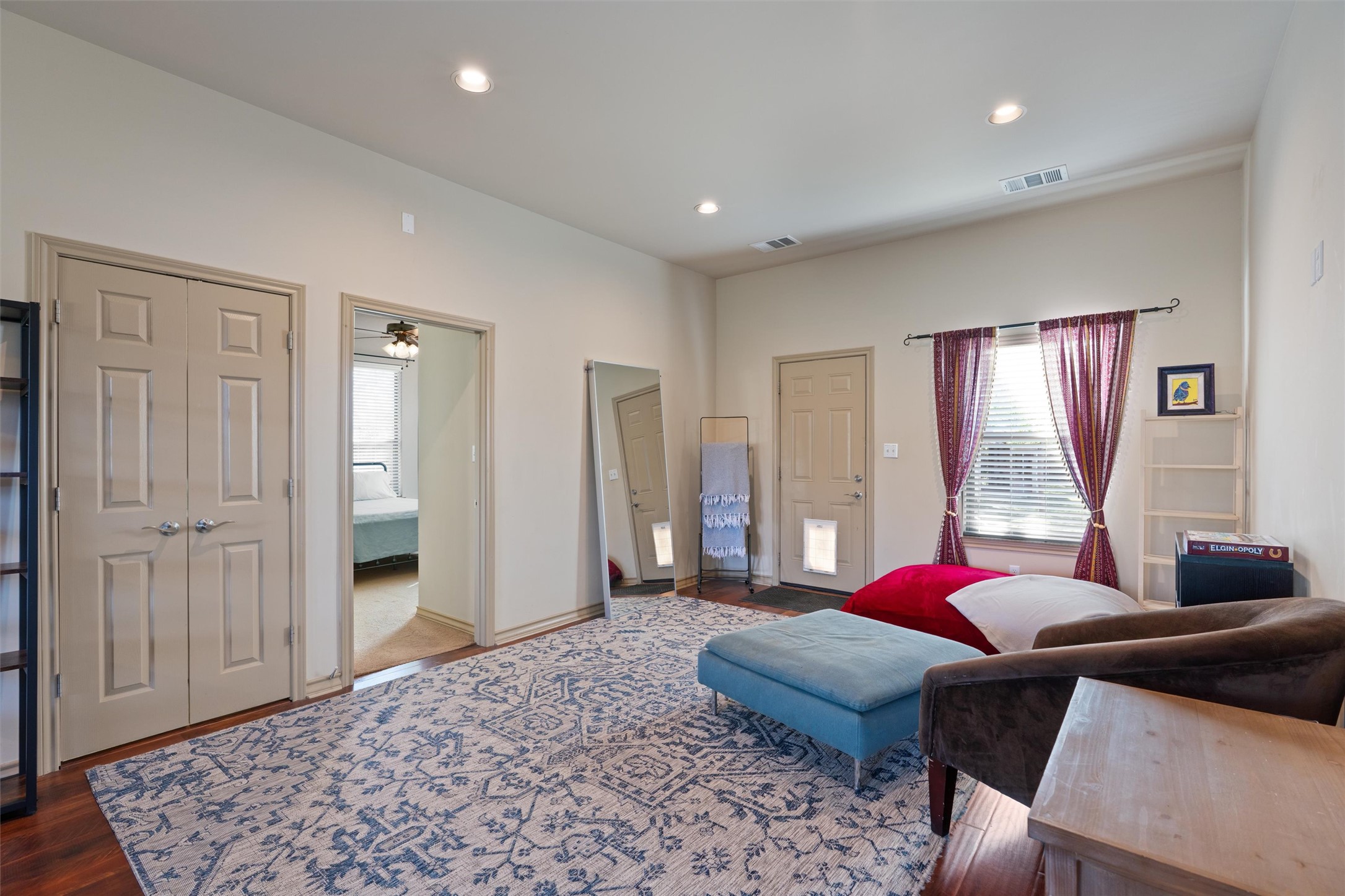 209 Harris Street Elgin, TX 78621 - Photo 6 of 40 Living room with recessed lighting and dark wood-style flooring