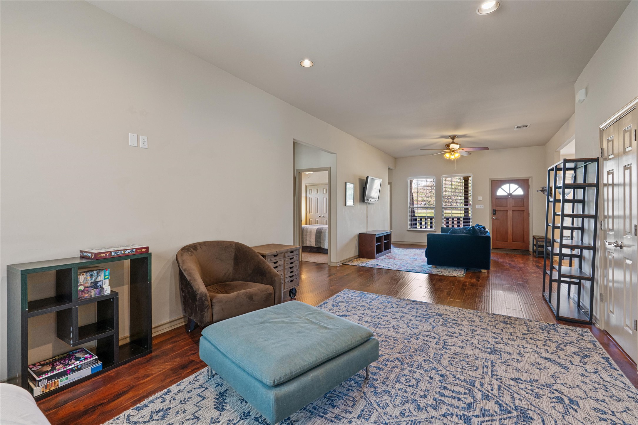 209 Harris Street Elgin, TX 78621 - Photo 7 of 40 Living room featuring dark wood finished floors, ceiling fan, and recessed lighting