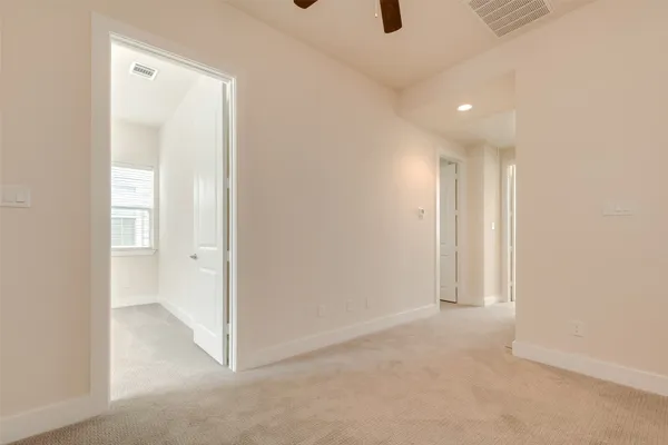 an empty room with a bathroom