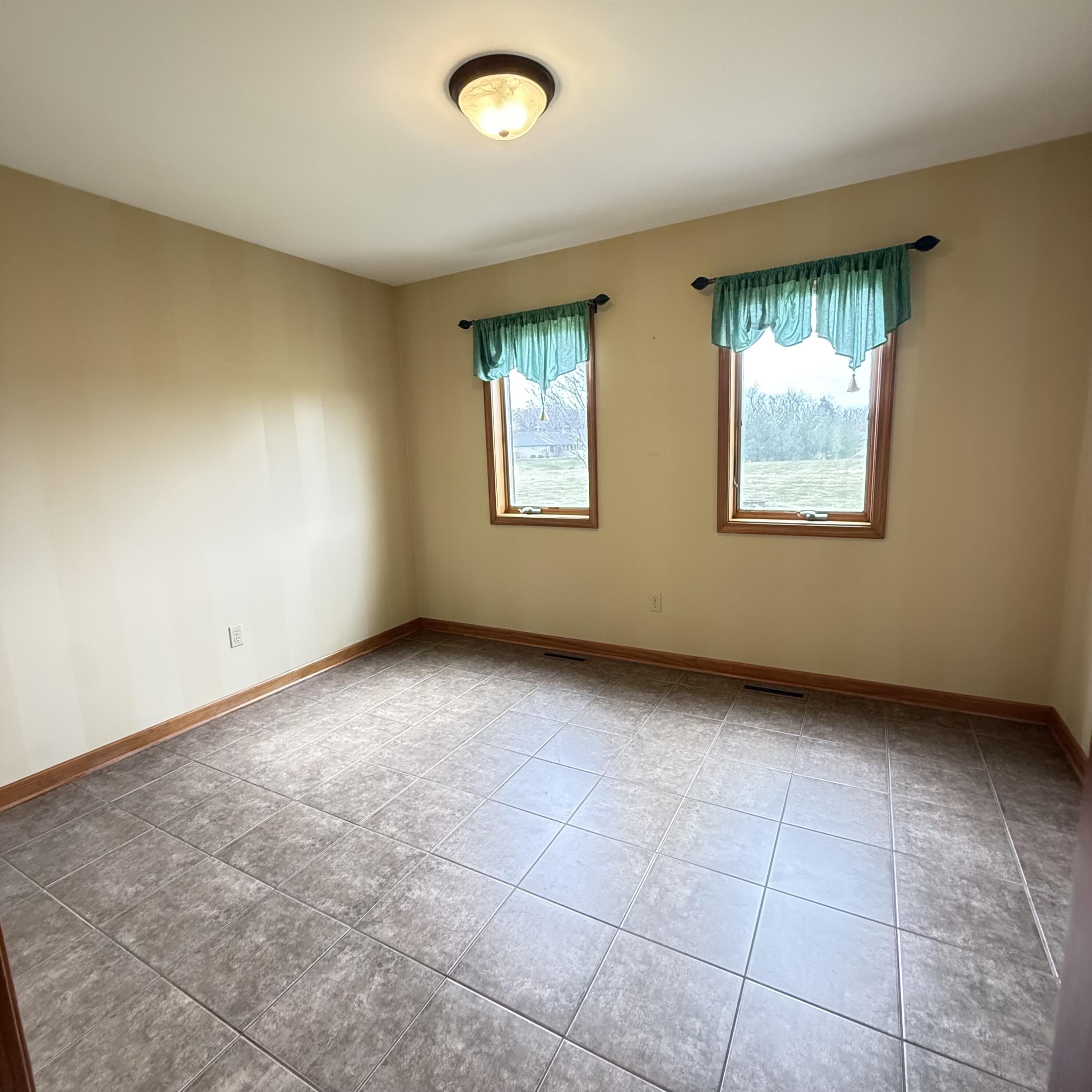 5005 West 152nd Court Crown Point, IN 46307 - Photo 14 of 22 a view of an empty room with a window