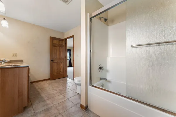 an empty room with a door