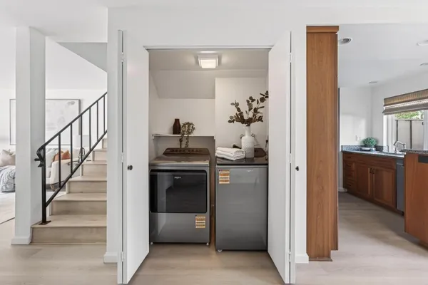 a view of a kitchen from the hallway