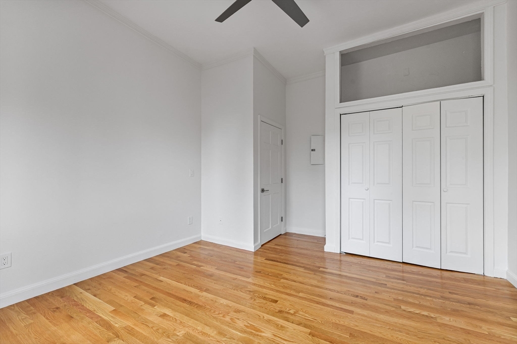 431 Columbus Avenue, Unit 4 Boston, MA 02116 - Photo 15 of 27 a view of empty room with wooden floor