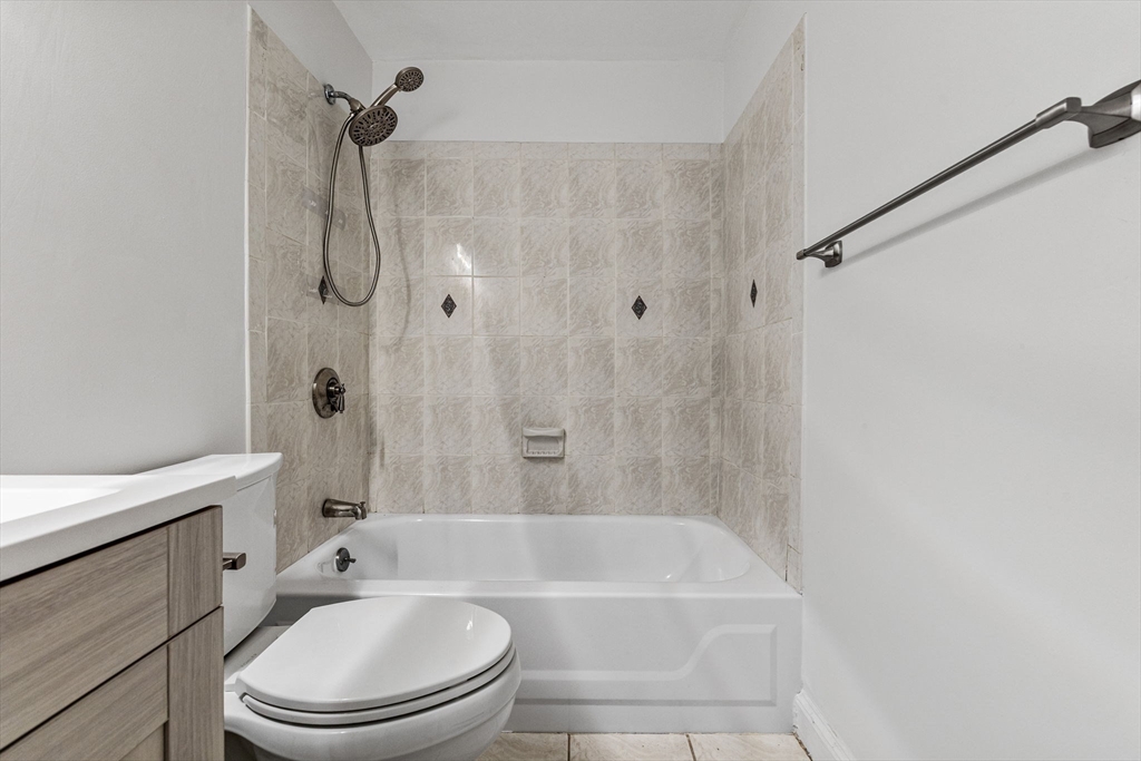431 Columbus Avenue, Unit 4 Boston, MA 02116 - Photo 19 of 27 a bathroom with a bathtub toilet and shower