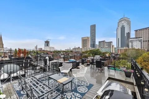 a view of a terrace with furniture