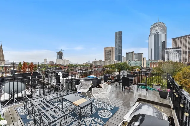 a view of a terrace with furniture