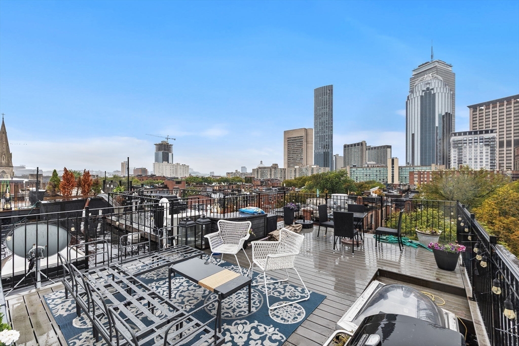 431 Columbus Avenue, Unit 4 Boston, MA 02116 - Photo 22 of 27 a view of a terrace with furniture