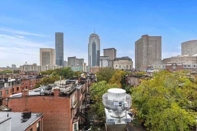 a view of a city with tall buildings