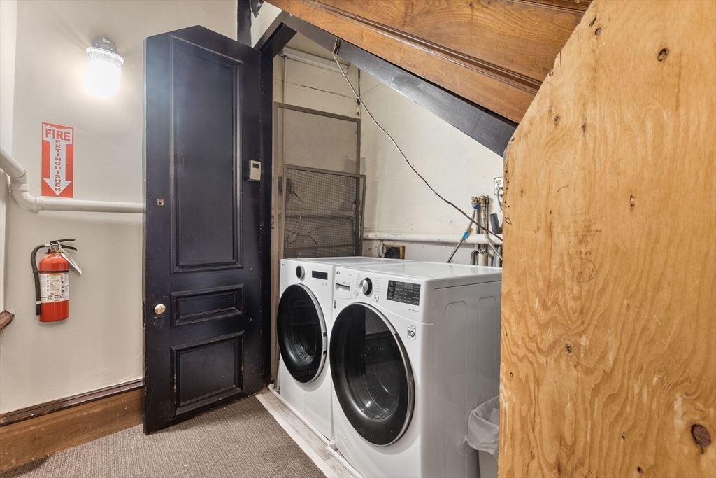 431 Columbus Avenue, Unit 4 Boston, MA 02116 - Photo 24 of 27 a utility room with dryer and washer