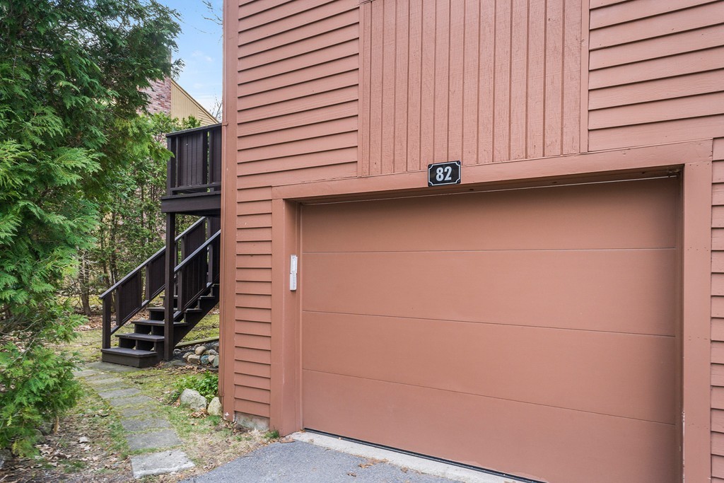 82 Meeting House Path, Unit 82 Ashland, MA 01721 - Photo 23 of 23 a view of a house with a garage