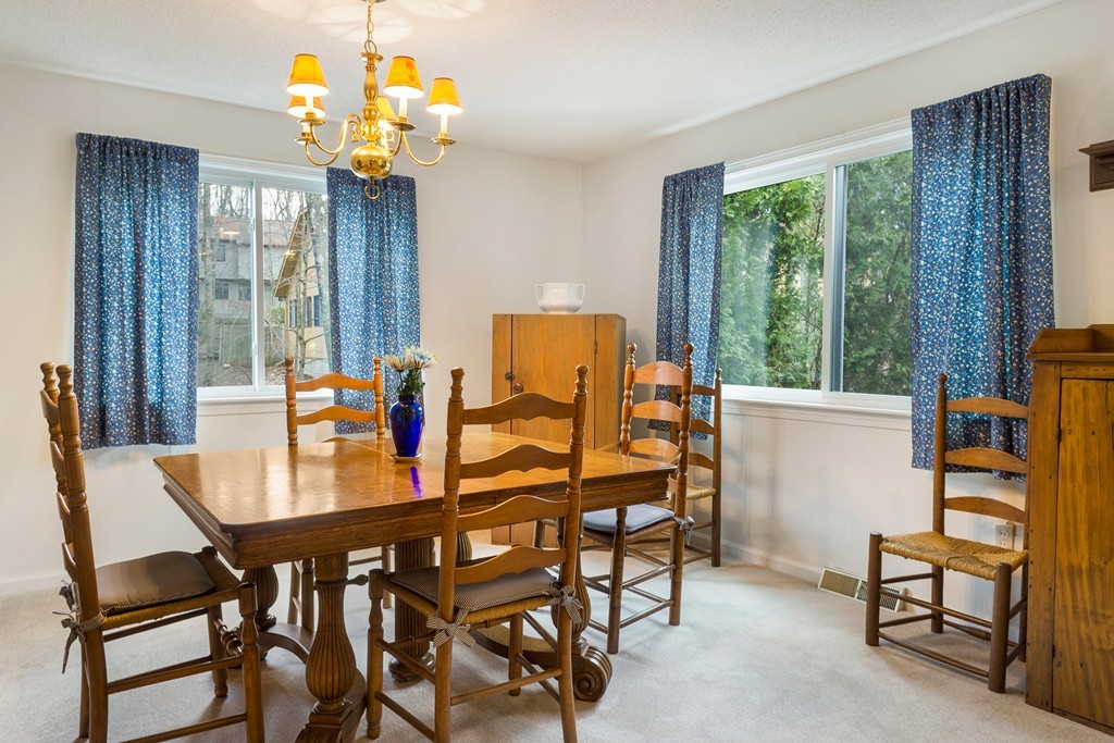 82 Meeting House Path, Unit 82 Ashland, MA 01721 - Photo 6 of 23 a view of a dining room with furniture window and outside view