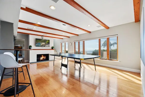 a living room with a couch and a large window