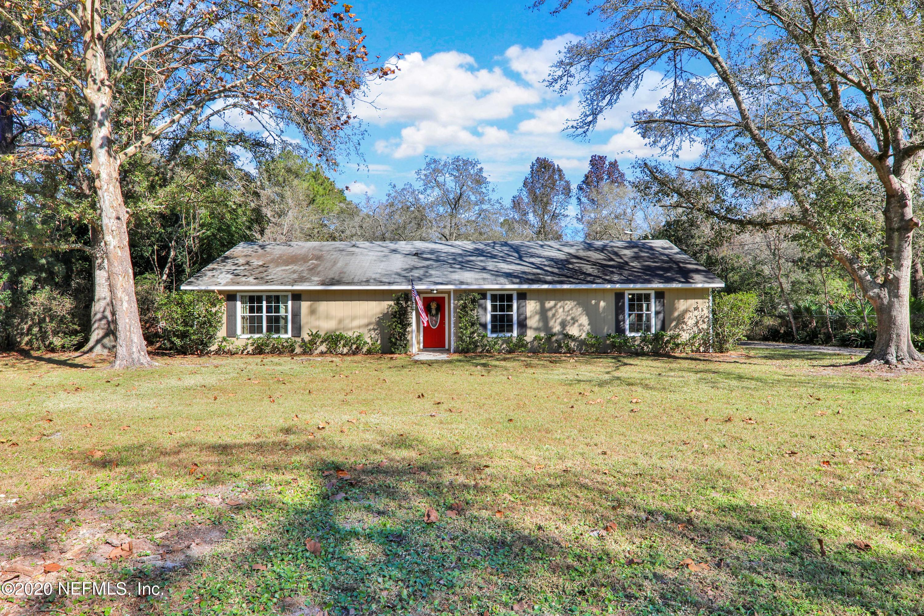 3133 Lannie Road Jacksonville, FL 32218 - Photo 2 of 25 Fully fenced front yard with gated drive