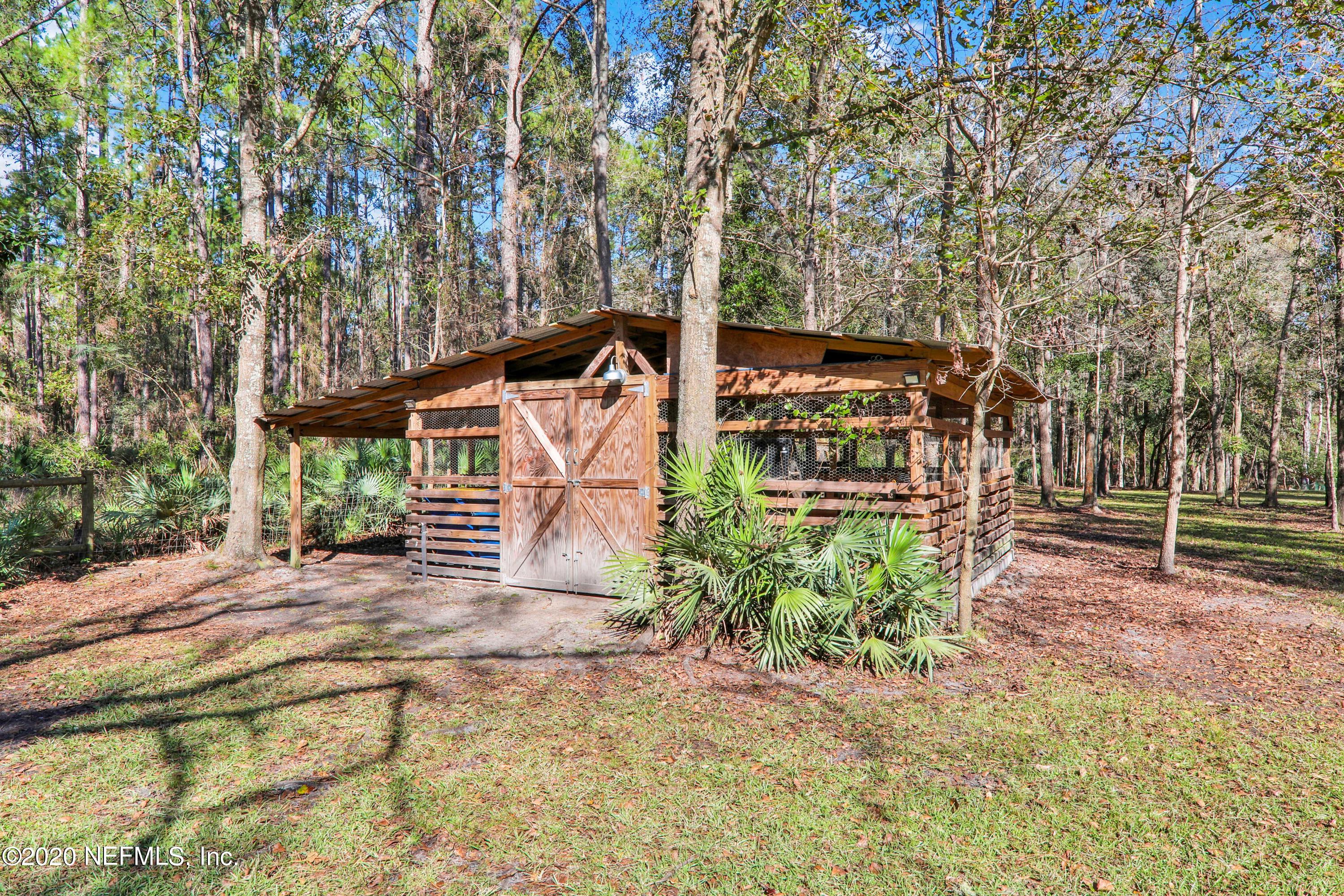 3133 Lannie Road Jacksonville, FL 32218 - Photo 7 of 25 Storage/animal enclosure w/ elec & water