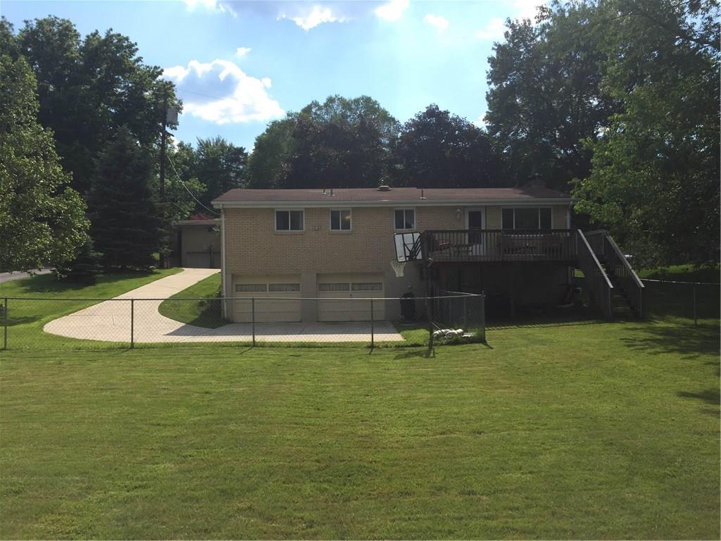 316 Byron Road Pittsburgh, PA 15237 - Photo 14 of 14 Table top back yard that is fenced in. Concrete driveway.