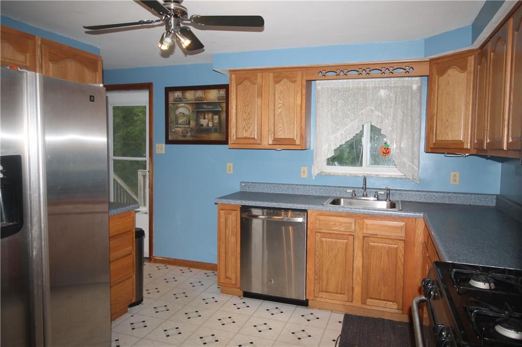 316 Byron Road Pittsburgh, PA 15237 - Photo 6 of 14 Updated fully equipped kitchen with door to deck and stainless appliances