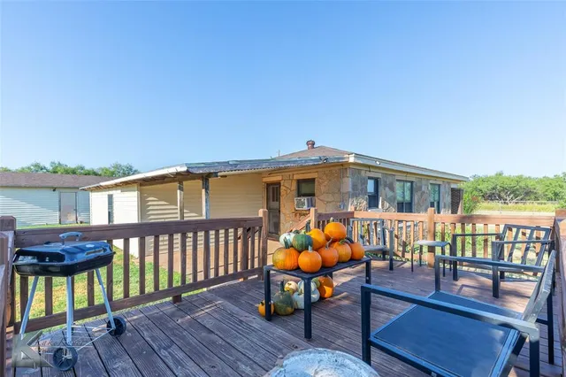 a front view of a house with patio outdoor seating