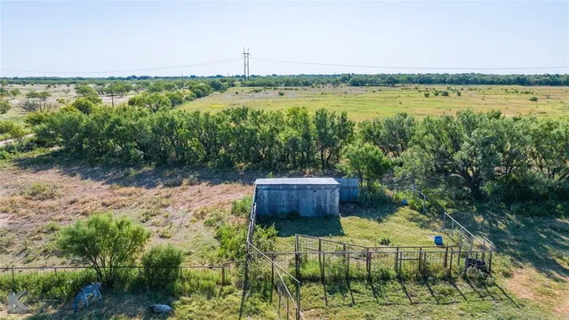 a garden view with a lake view