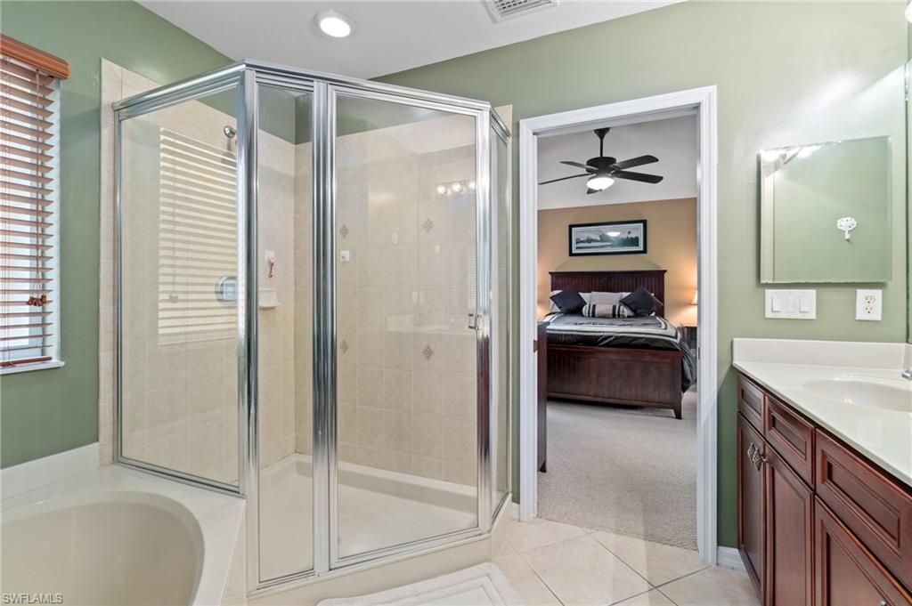 17577 Brickstone Loop Fort Myers, FL 33967 - Photo 14 of 33 a kitchen with a refrigerator and a sink