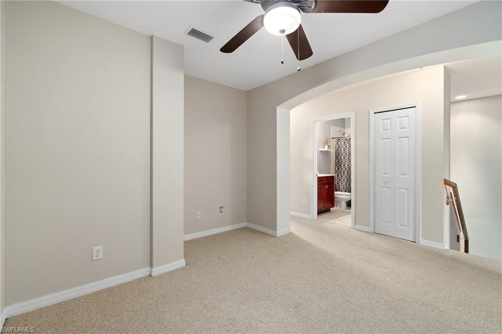 17577 Brickstone Loop Fort Myers, FL 33967 - Photo 18 of 33 wooden floor in an empty room
