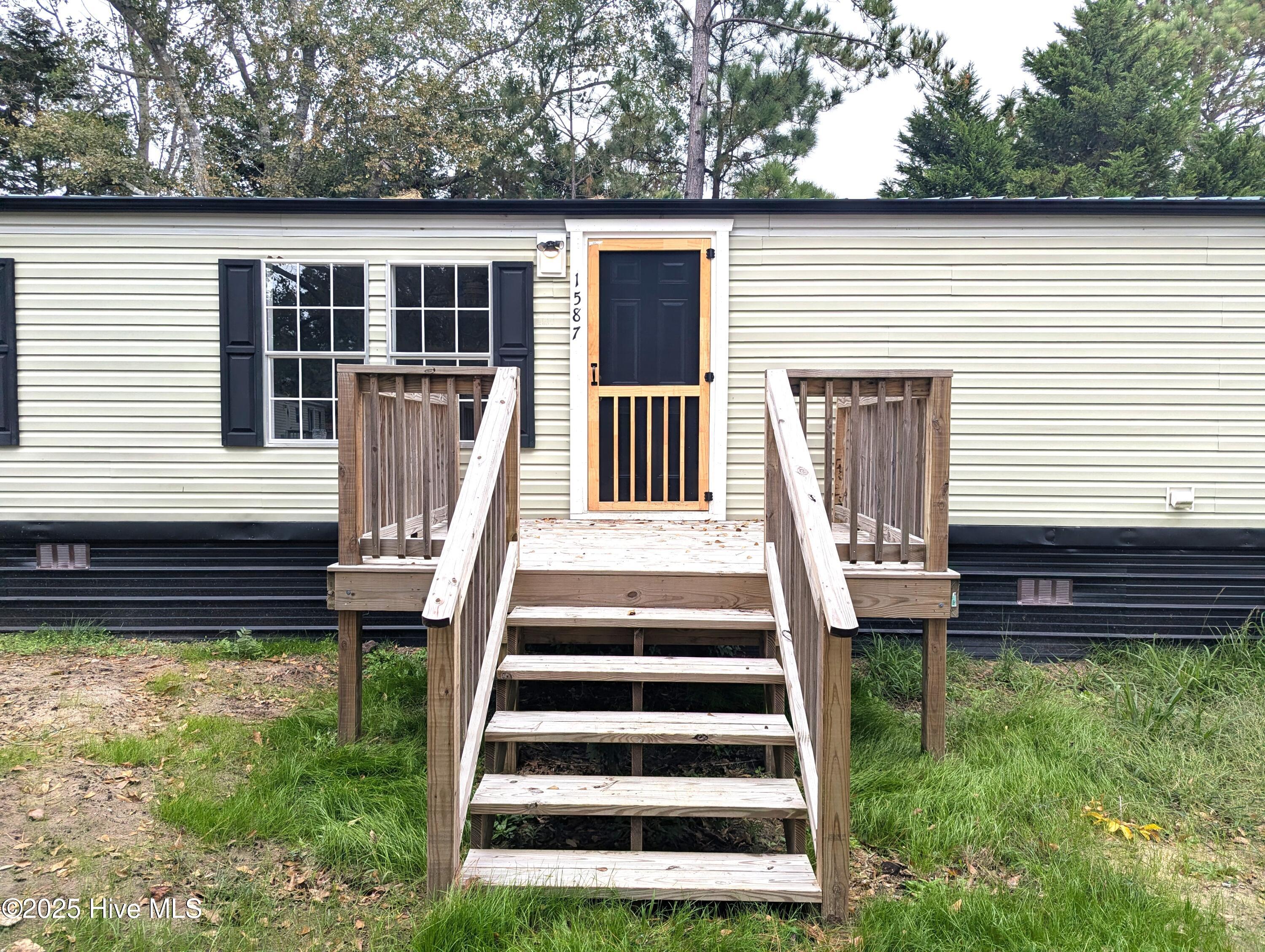 1587 Snapper Street Southwest Shallotte, NC 28470 - Photo 1 of 19 Front steps