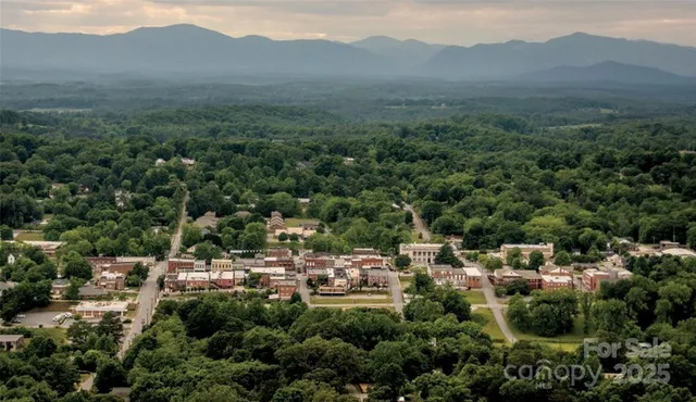 an aerial view of residential house with outdoor space