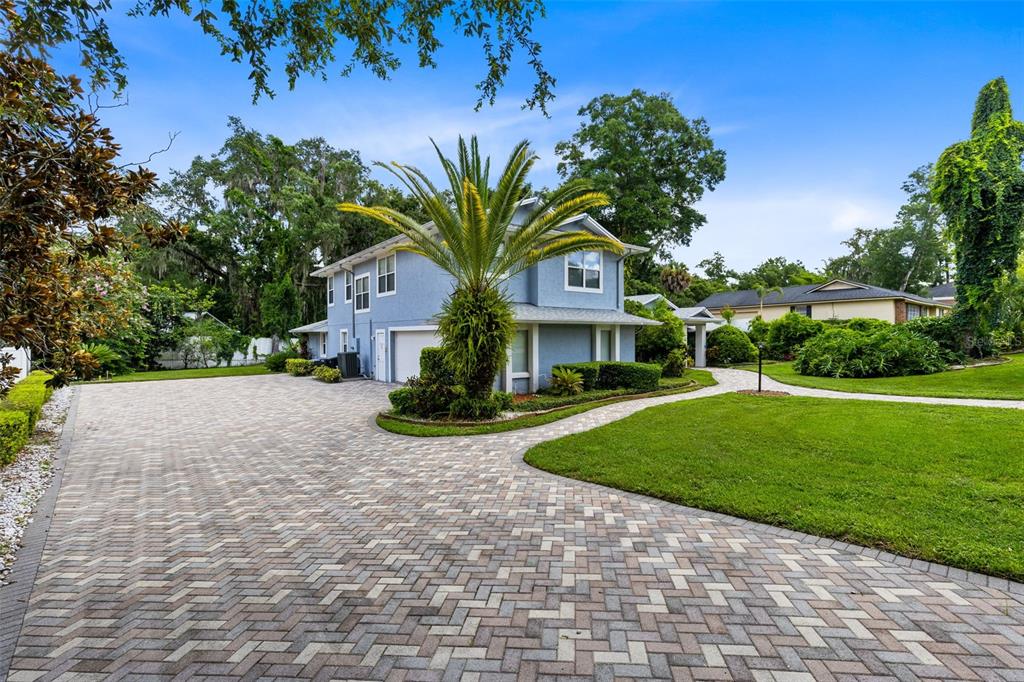 111 Variety Tree Circle Altamonte Springs, FL 32714 - Photo 32 of 35 A view of the extended driveway and oversized two car garage.