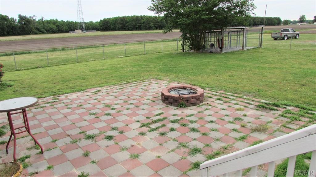 159 Scotland Road Camden, NC 27921 - Photo 34 of 49 Patio and fire pit