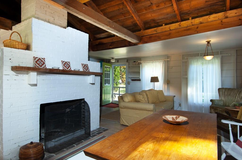 27 Massachusetts Road West Boothbay Harbor, ME 04575 - Photo 5 of 21 Fireplace, Dining Table in Foreground