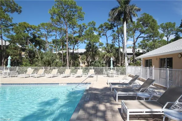 a view of a backyard with a patio