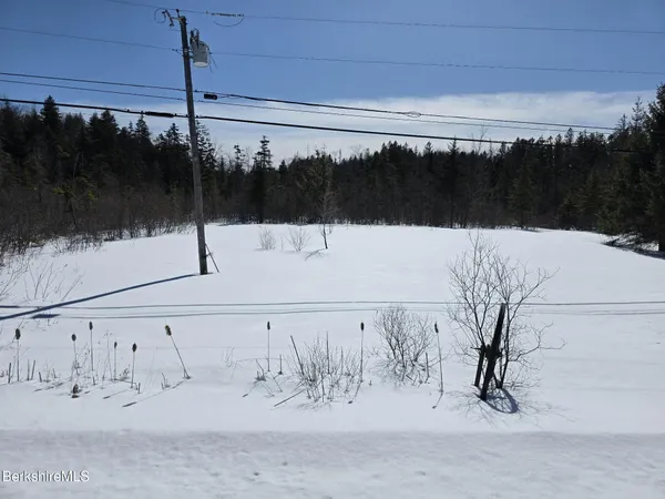 a view of a backyard of snow
