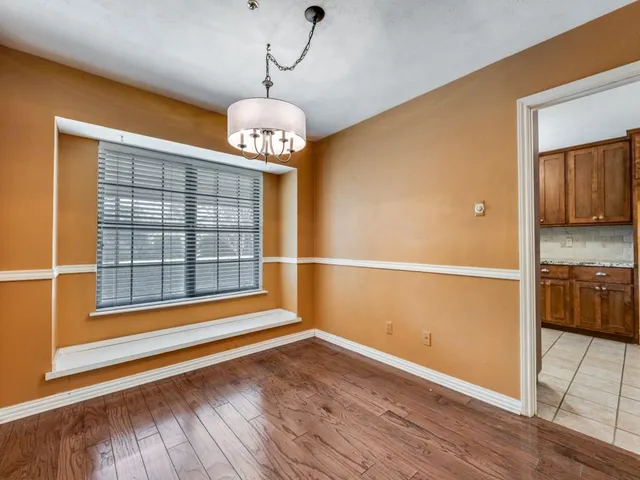 a view of livingroom with hardwood floor and sink