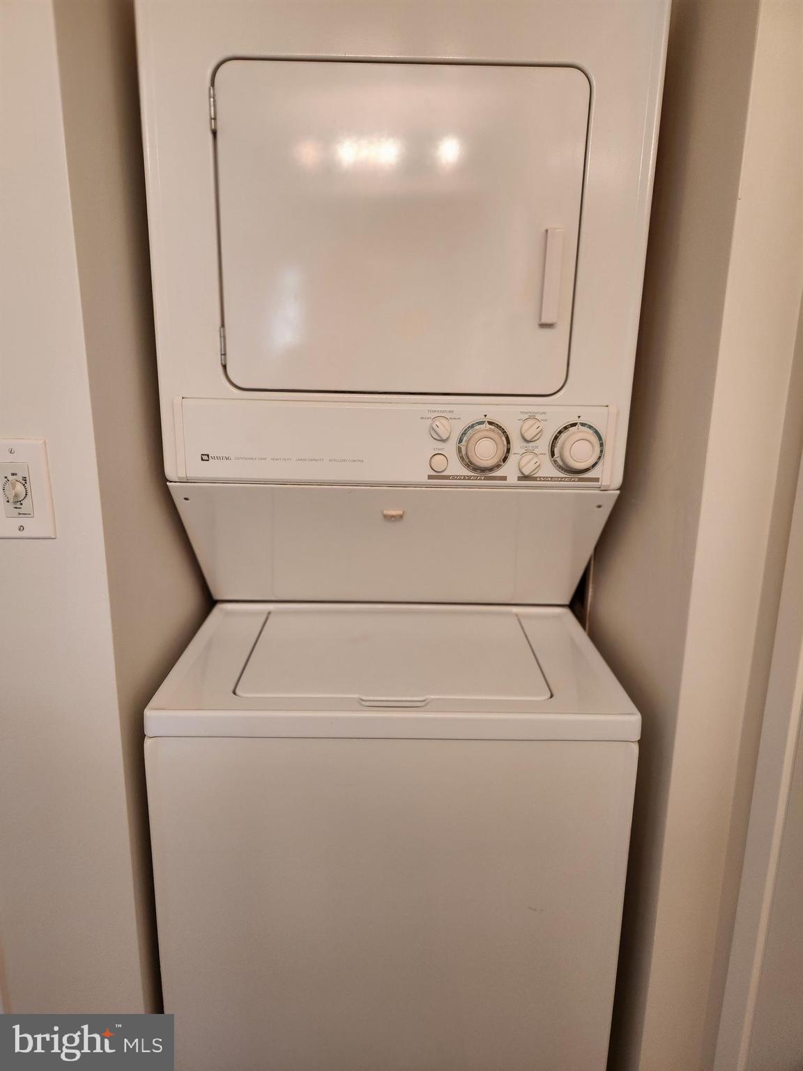 7111 Woodmont Avenue, Unit 514 Chevy Chase, MD 20815 - Photo 21 of 38 a close up view of washer and dryer