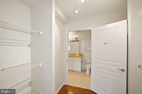 a view of a bathroom from the hallway