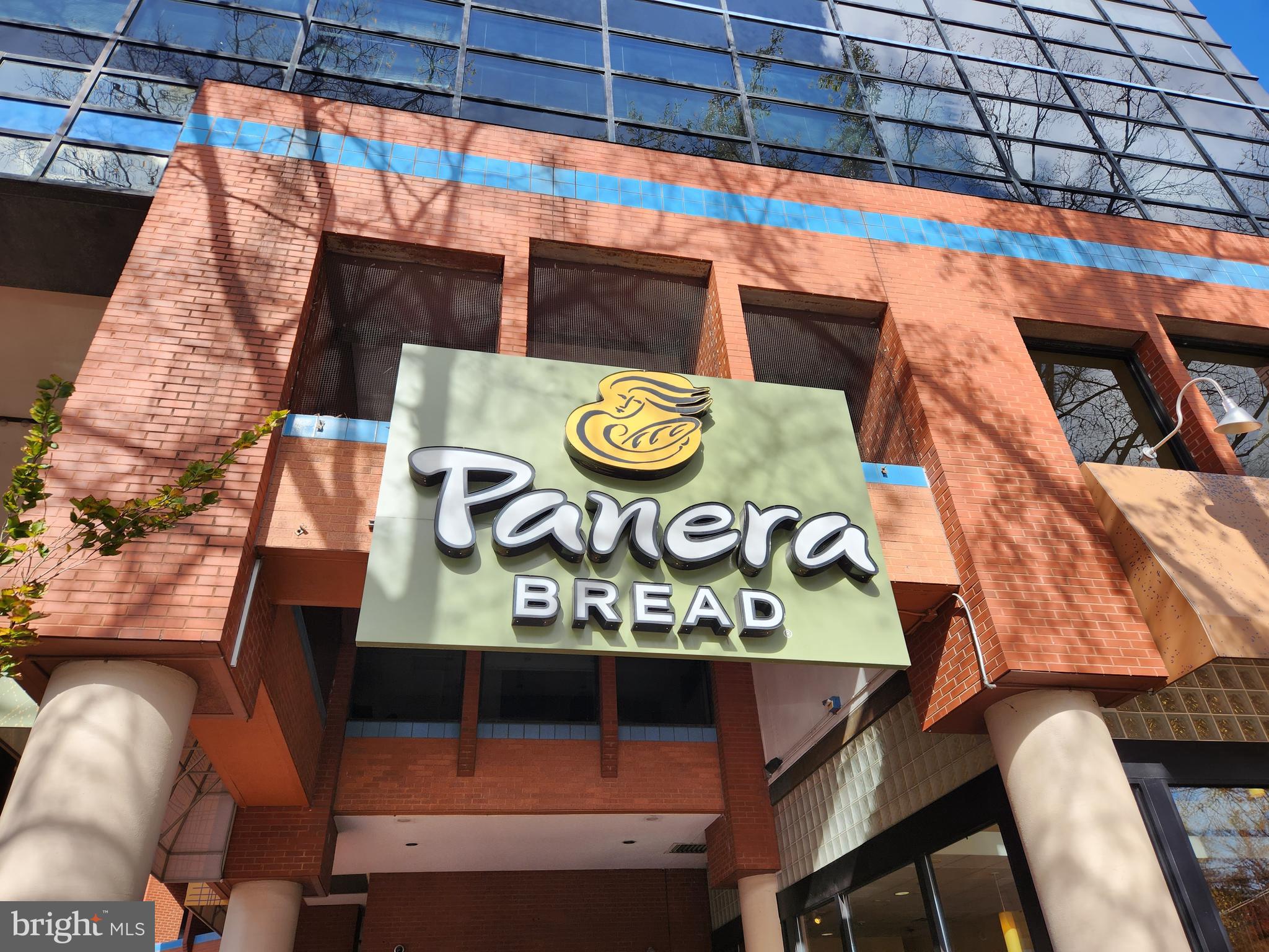 7111 Woodmont Avenue, Unit 514 Chevy Chase, MD 20815 - Photo 32 of 38 a sign that is on a table