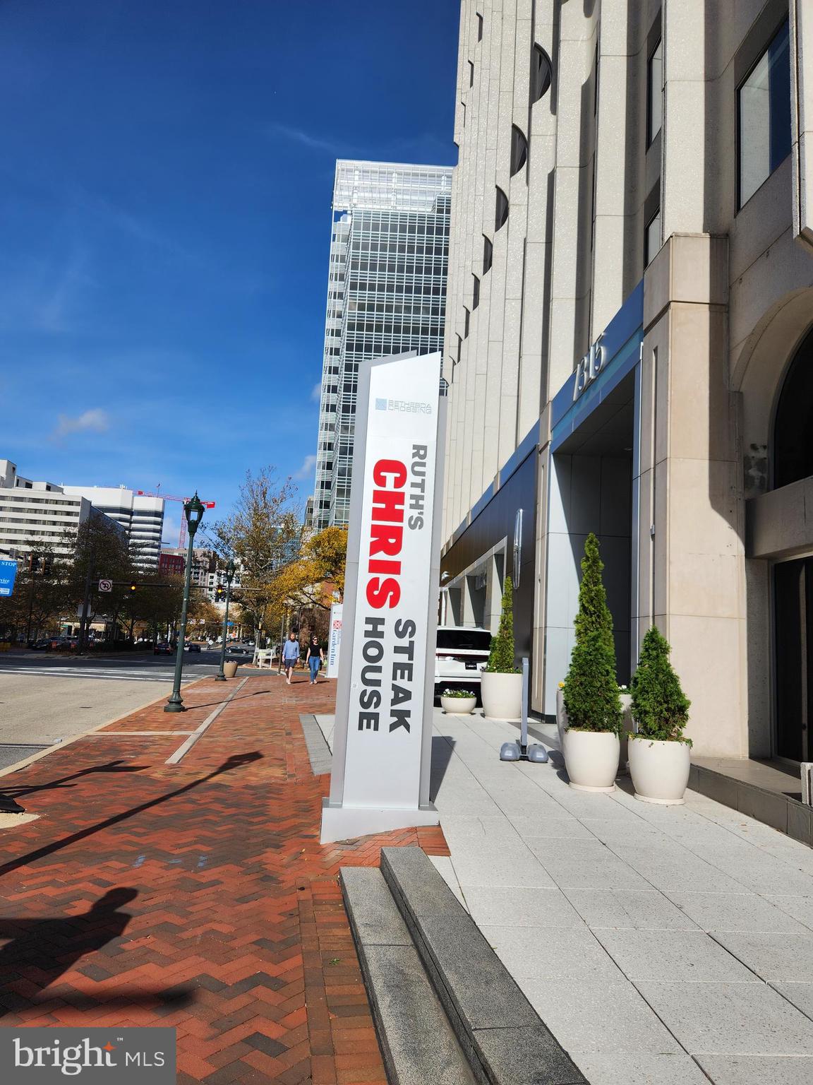 7111 Woodmont Avenue, Unit 514 Chevy Chase, MD 20815 - Photo 34 of 38 a building with trees in front of it