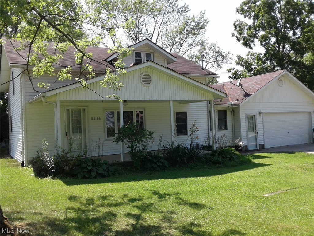 5566 Linn Road Amherst, OH 44001 - Photo 2 of 32 Beautiful porch and large garage!