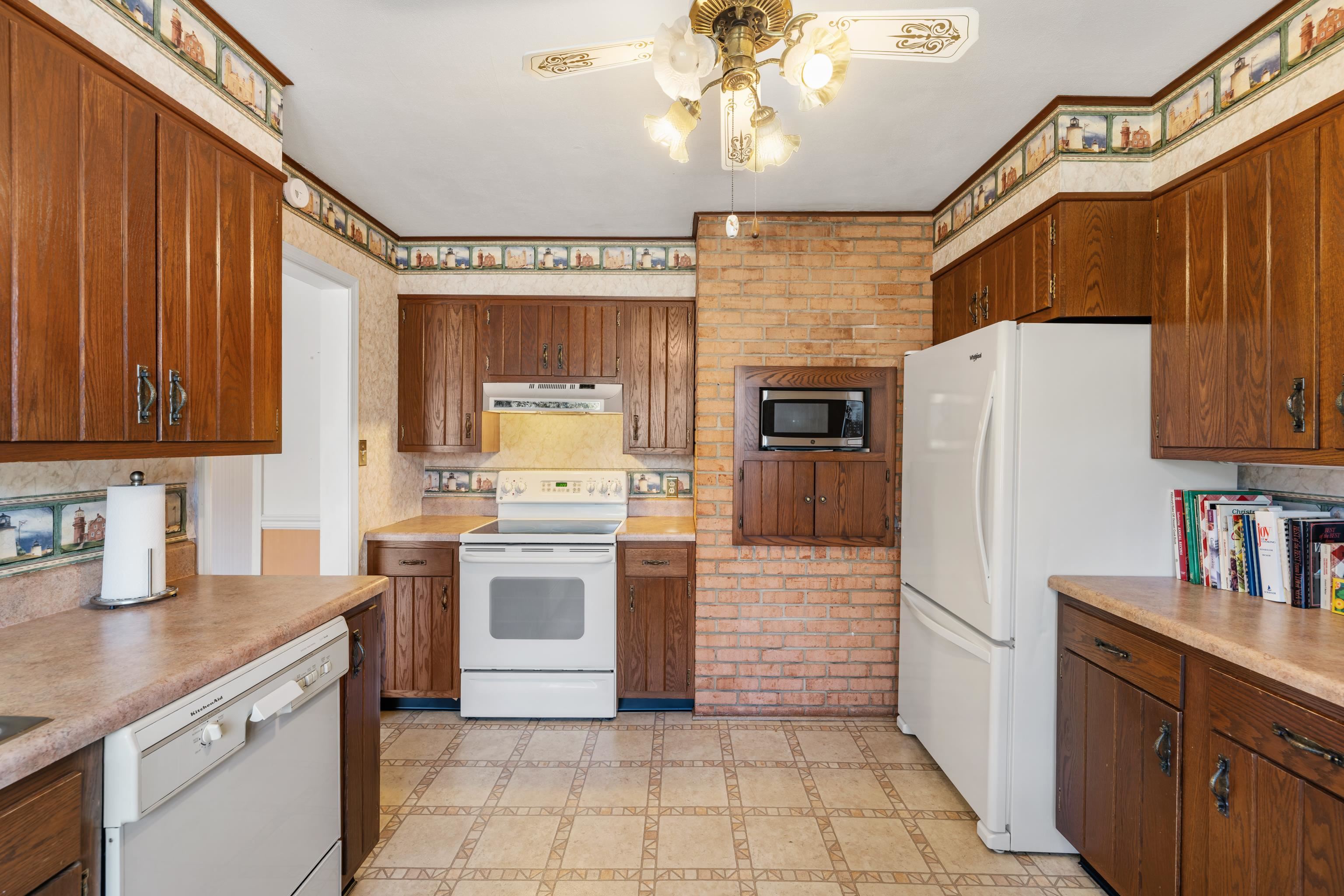 431 Mt Pisgah Road Mount Sidney, VA 24467 - Photo 22 of 72 a kitchen with a stove sink and refrigerator