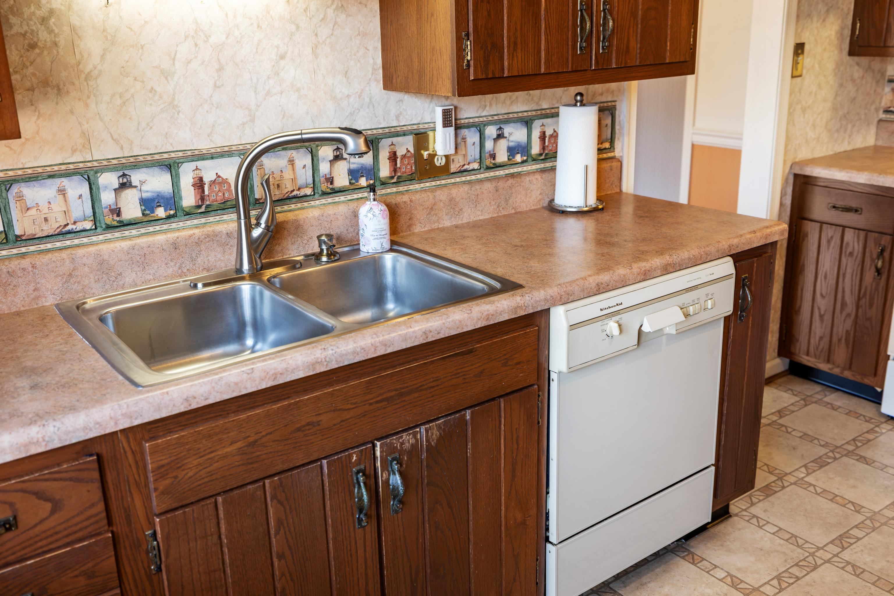 431 Mt Pisgah Road Mount Sidney, VA 24467 - Photo 27 of 72 a view kitchen with kitchen island a sink wooden floor and a counter top space