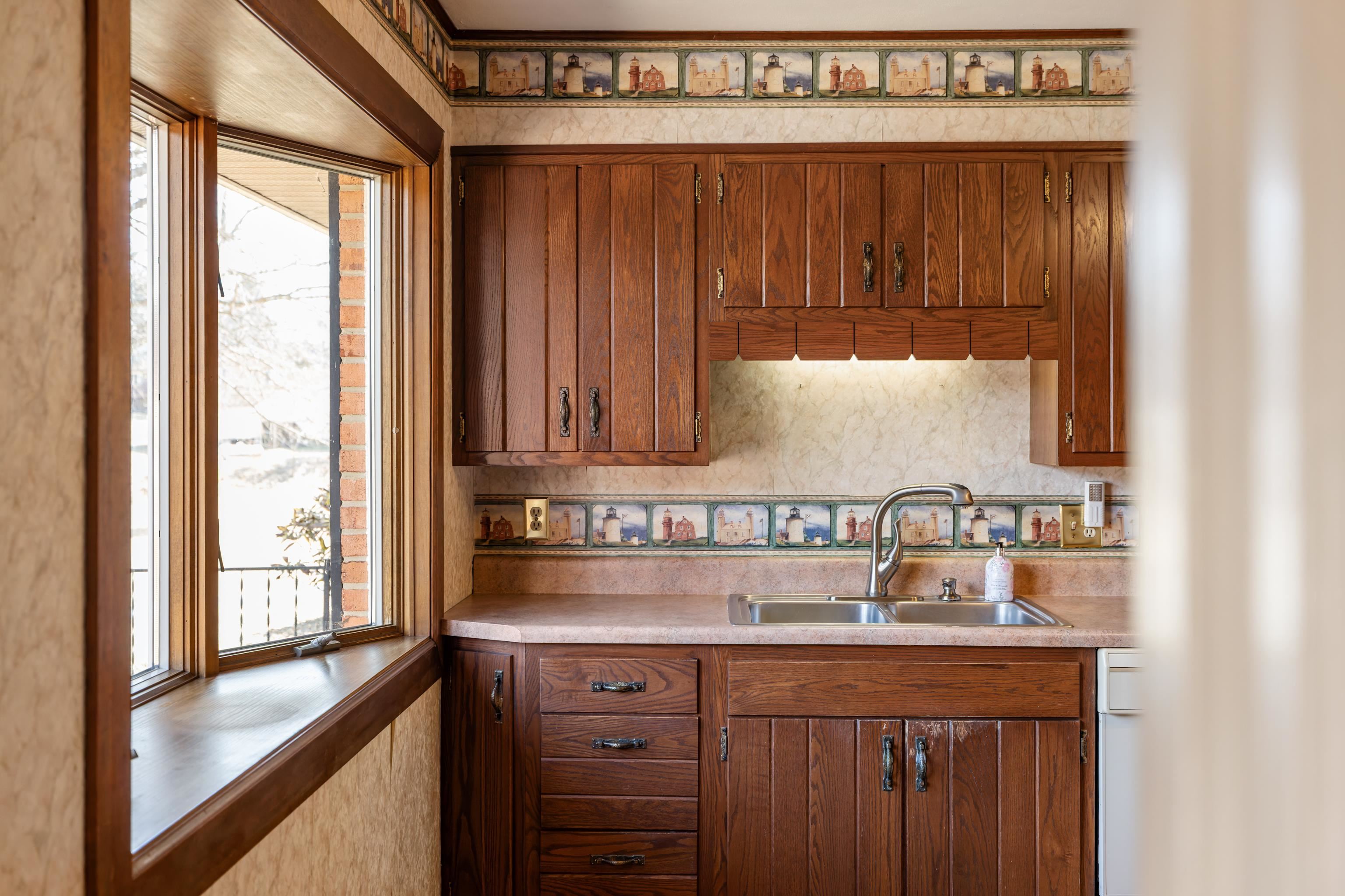 431 Mt Pisgah Road Mount Sidney, VA 24467 - Photo 29 of 72 a kitchen with a sink and a wooden floor