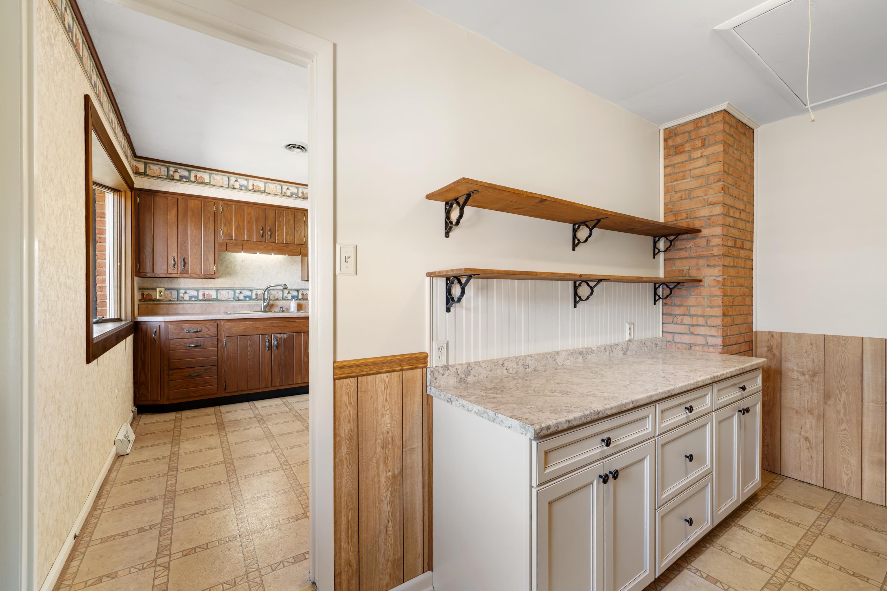 431 Mt Pisgah Road Mount Sidney, VA 24467 - Photo 30 of 72 a kitchen with stainless steel appliances granite countertop a sink stove and cabinets