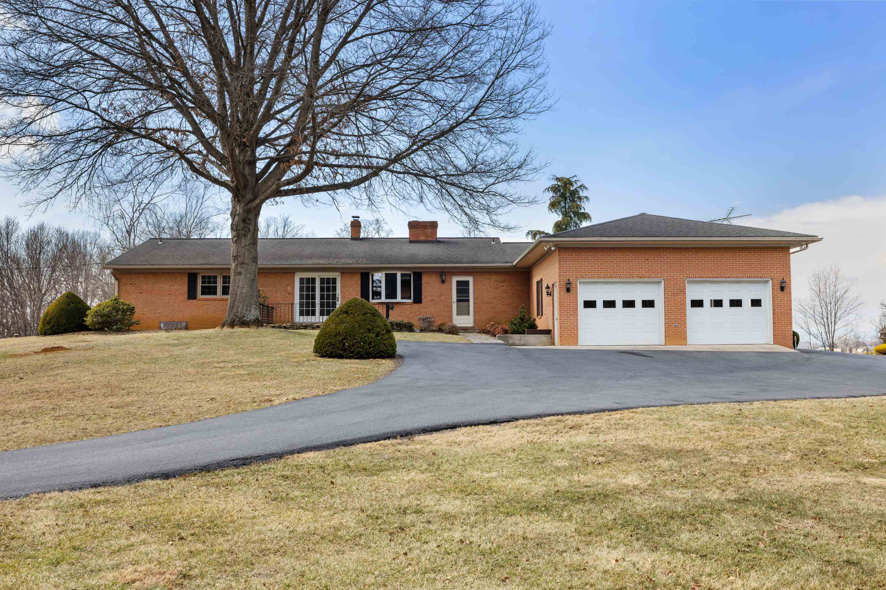 431 Mt Pisgah Road Mount Sidney, VA 24467 - Photo 3 of 72 a front view of a house with a yard and garage