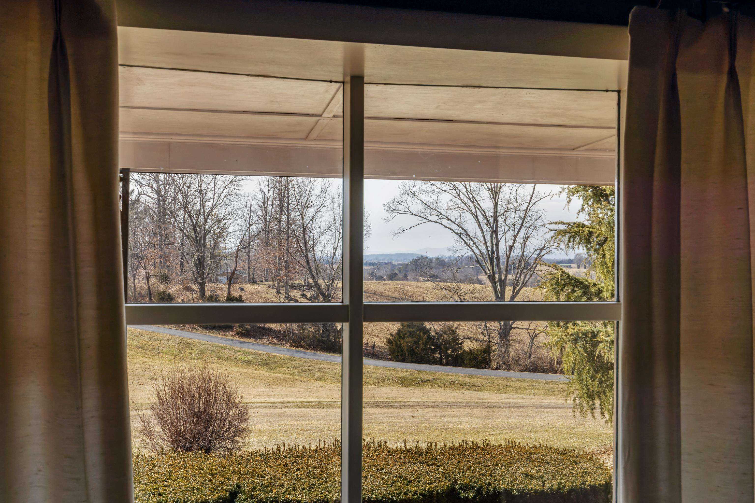 431 Mt Pisgah Road Mount Sidney, VA 24467 - Photo 44 of 72 a view of a glass door with a lake view