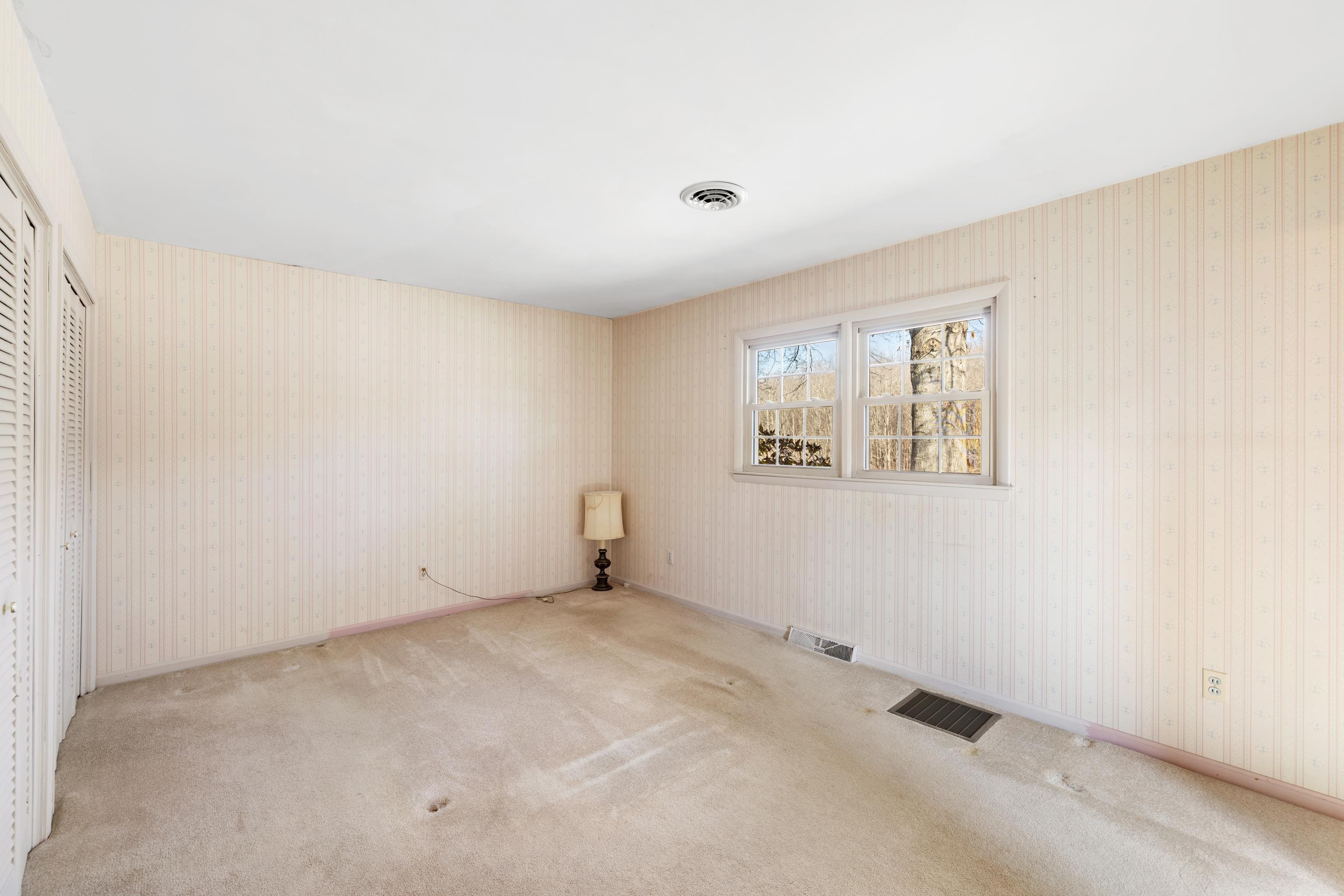 431 Mt Pisgah Road Mount Sidney, VA 24467 - Photo 46 of 72 an empty room with windows