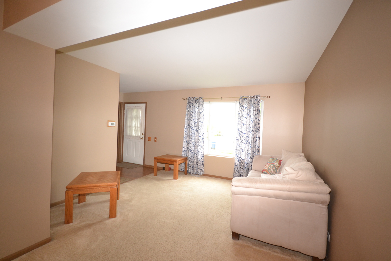 1113 Sawmill Lane Algonquin, IL 60102 - Photo 14 of 33 a living room with furniture and a window